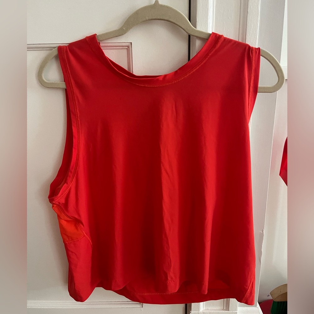 Athleta ultimate muscle tank.  Size large in color red. Mesh on upper back.